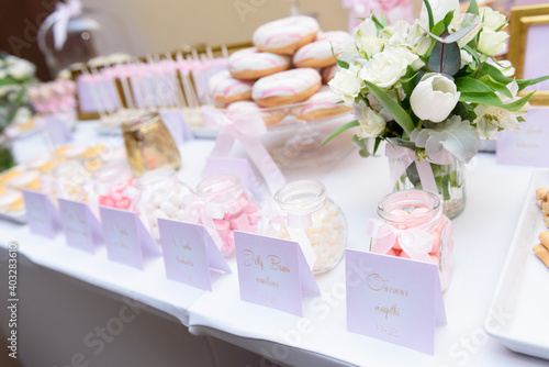 Various type of sweets on a candy bar at the wedding party