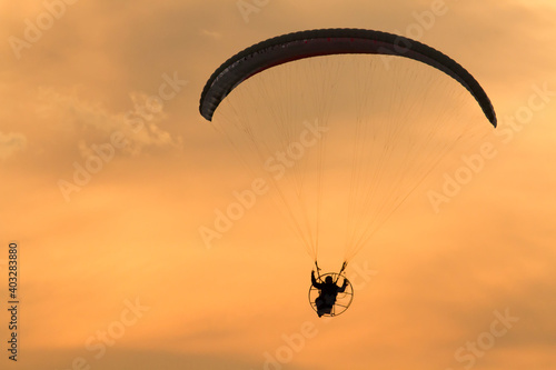 Paragliding at sunset 