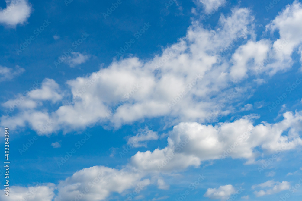 Cirrus and cumulus clouds on blue sky background. Cirrus and cumulus clouds on blue sky background.