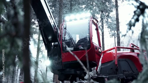 Logging Machine in the woods. Forest machinery, Cutting trees