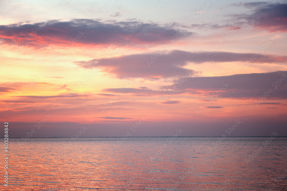 Beautiful gentle pink blue sunset over the calm sea, beautiful natural background