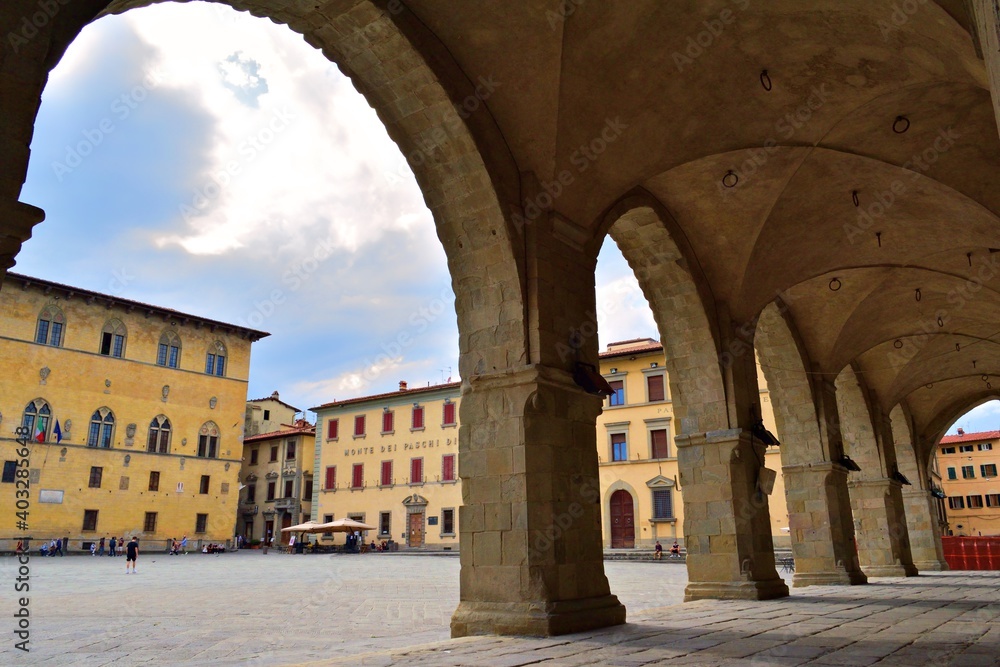 glimpse of Piazza Duomo in the historic center of the city of Pistoia in Tuscany, Italy