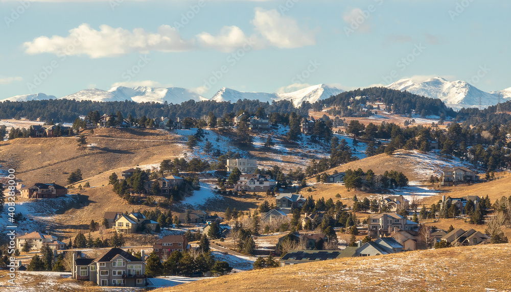 Colorado Living. Golden, Colorado - Denver Metro Area Residential Winter Panorama with the view of a Front Range mountains in the distance