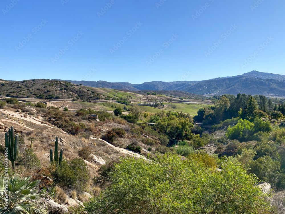 Naklejka premium Valley and mountain view with blue sky in San Diego, California. USA
