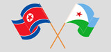 Crossed and waving flags of North Korea and Djibouti