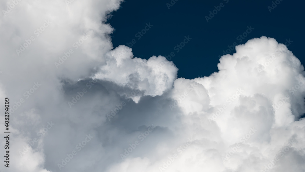 Fototapeta premium Mountainous Cumulus Clouds Boiling in the Summer Sky