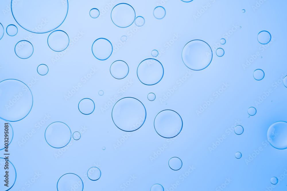 Water background with bubbles for website, advertising cosmetics and other product. Colorful abstract backdrop with bright gradients on blobs. Blue overflowing color