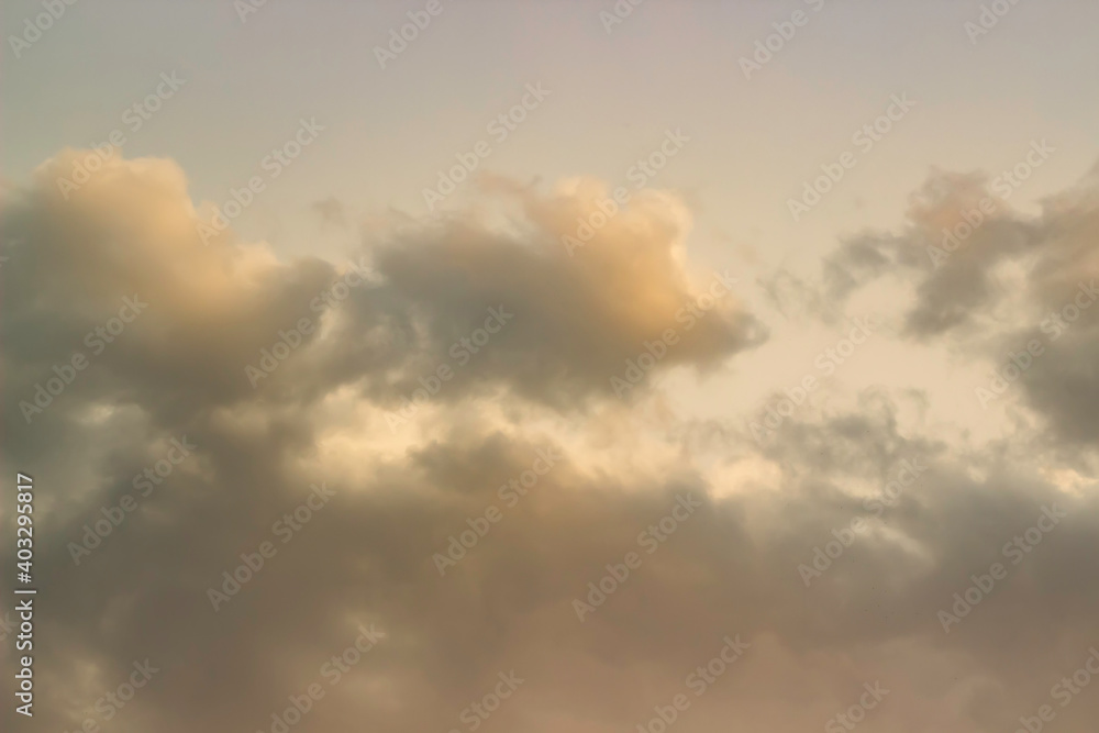 Clouds at sunset. Background with clouds at sunset. Clouds texture.