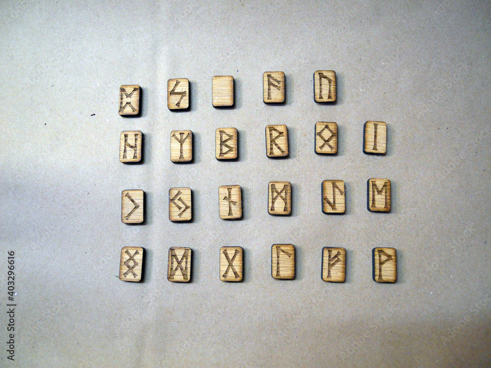 Foto de Homemade Scandinavian runes for divination. The runes say