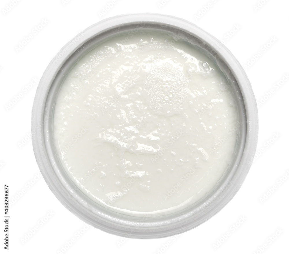 Soured milk, yogurt in cup isolated on white background, top view Soured milk, yogurt in cup isolated on white background, top view