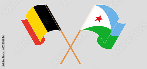 Crossed and waving flags of Belgium and Djibouti