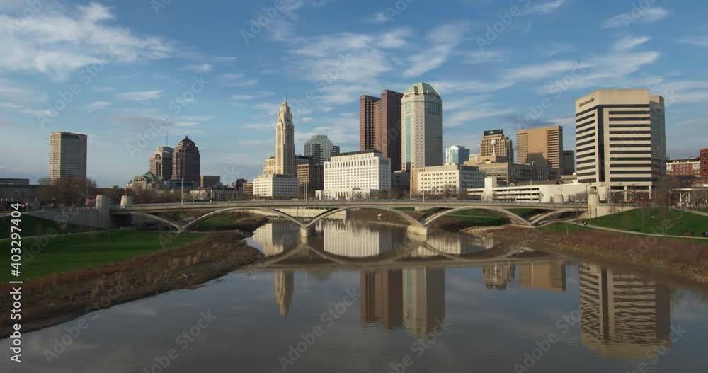 Time lapse landscape wide shot of downtown Columbus, Ohio, capital city full of buildings, bridges, and Scioto Mile Time lapse landscape wide shot of downtown Columbus, Ohio, capital city full of buildings, bridges, and Scioto Mile