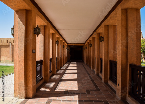 View in perspective of a corridor lined with windows inside Sheikh Zayed Palace Museum. Al Ain  United Arab Emirates.