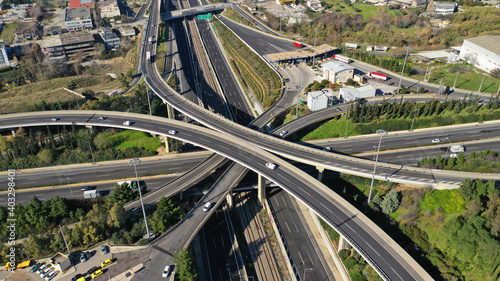 Aerial drone photo of modern Attiki Odos toll road interchange with National road in Attica  Athens  Greece