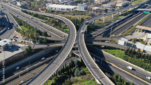 Aerial drone photo of multilevel junction national road crossing urban Metropolitan area