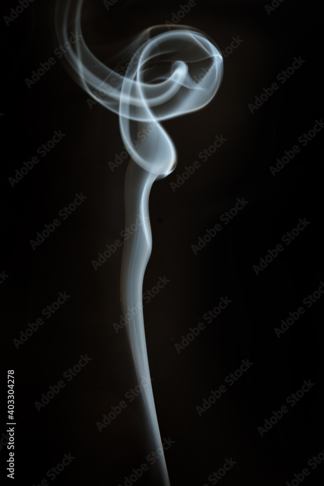 Abstract shape smoke in motion on a black background Abstract shape smoke in motion on a black background