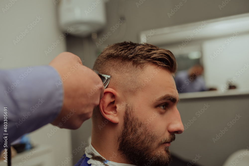 Fototapeta premium Hipster client visiting barber shop 
