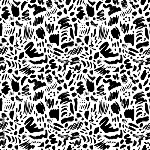 Doodle shapes and scratched lines seamless pattern. Vector abstract dots  brush strokes  bold funky drawing elements. Hand painted ink background. Art illustration for fashion designs in trendy style