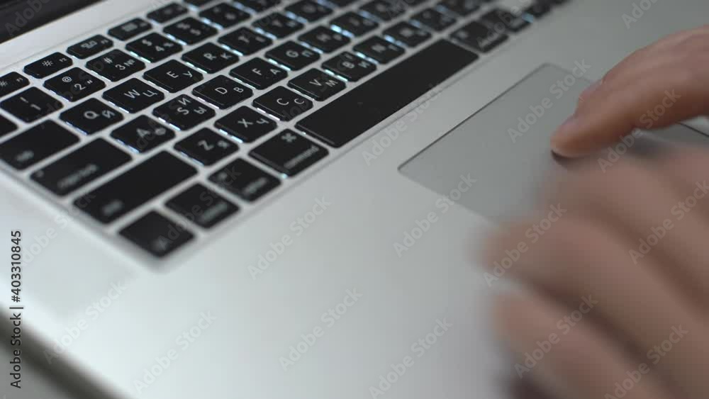 Hand typing on laptop keyboard, personal computer use for work at office or home Hand typing on laptop keyboard, personal computer use for work at office or home