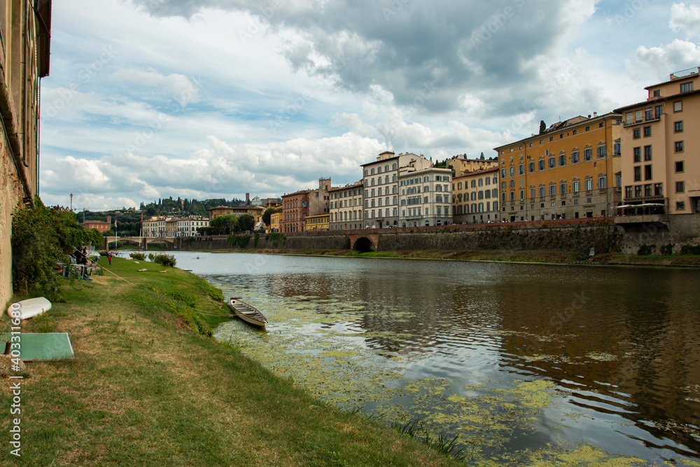 Fototapeta premium Florence on the river bank. City of Florence, Italy. Typical Italian city. 