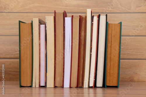 Books on wooden background. Education concept. 