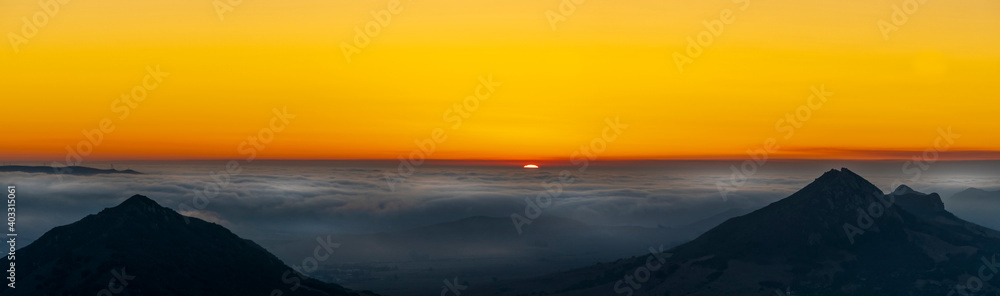 Panorama view of Layer of Clouds, Sunset, Mountains