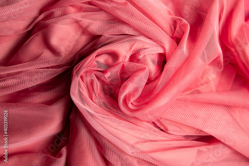 pink crumpled tulle fabric. fabric background