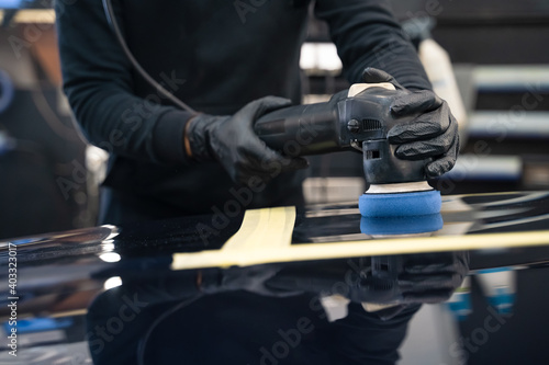 Professional car paint polishing process. Car detailing process