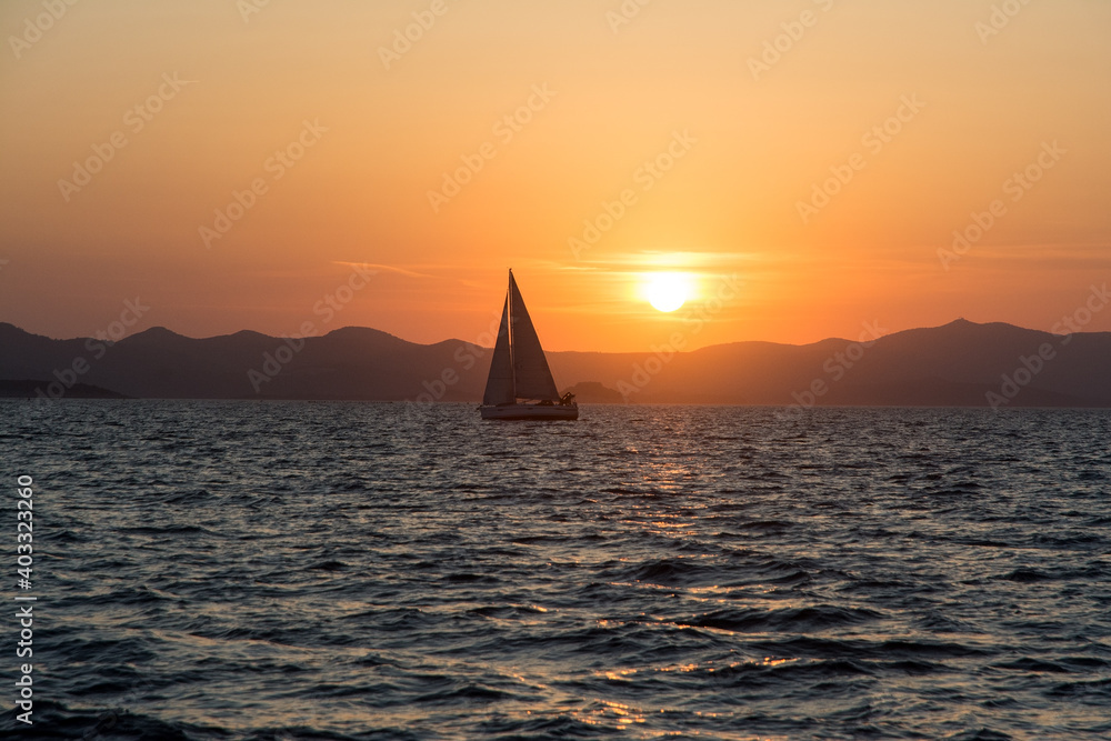 view of a sailing yacht at sunset, Croatia