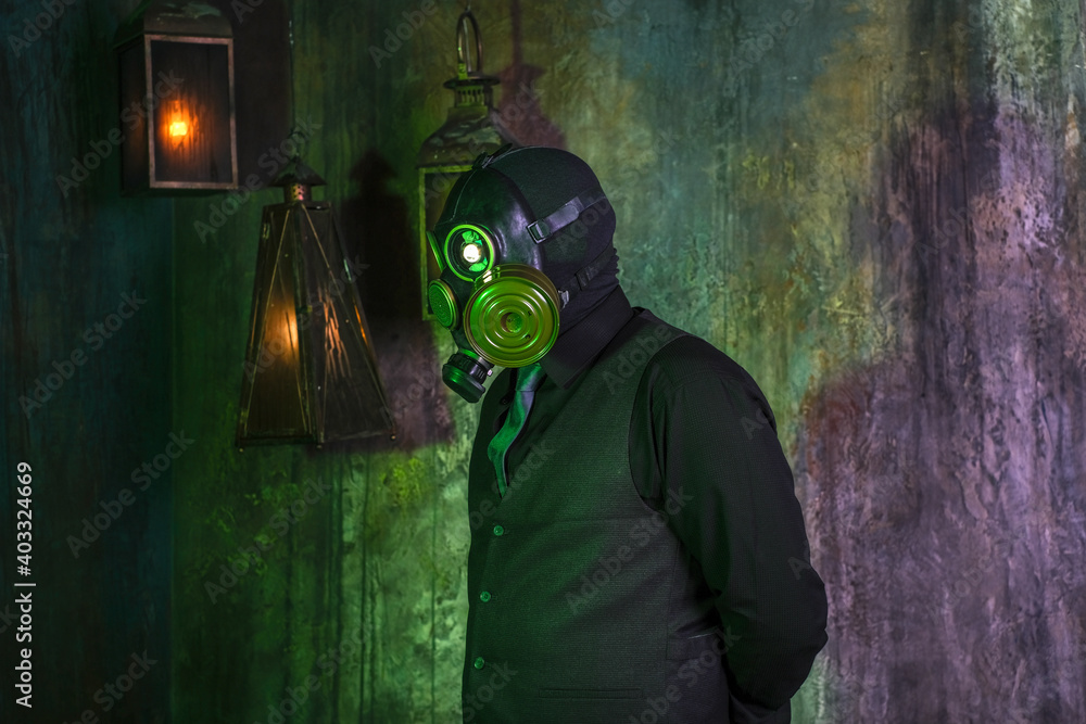 Spændende læber Aske cosplay of a guy in a gas mask on a green background with glowing eyes  Stock Photo | Adobe Stock