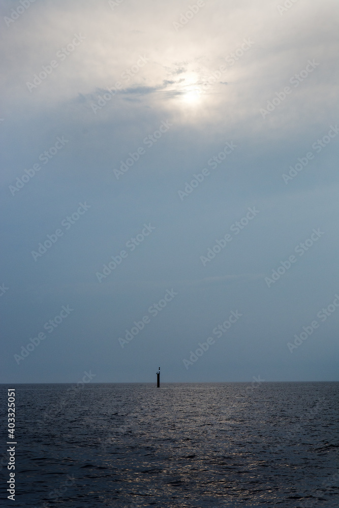 view of the lighthouse in the sea during twilight