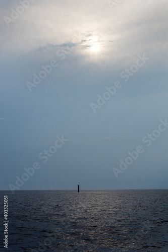view of the lighthouse in the sea during twilight