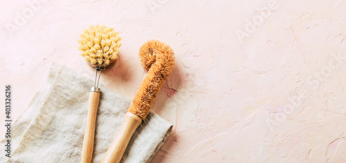 Eco cleaning. Dishwashing brush made of wood with natural bristles.