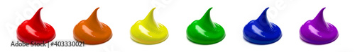 фотографія Drops of Rainbow Colored Paint on a White Background