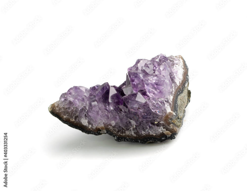Amethyst crystals isolated. Purple quartz pebbles and crystal Amethyst crystals isolated. Purple quartz pebbles and crystal