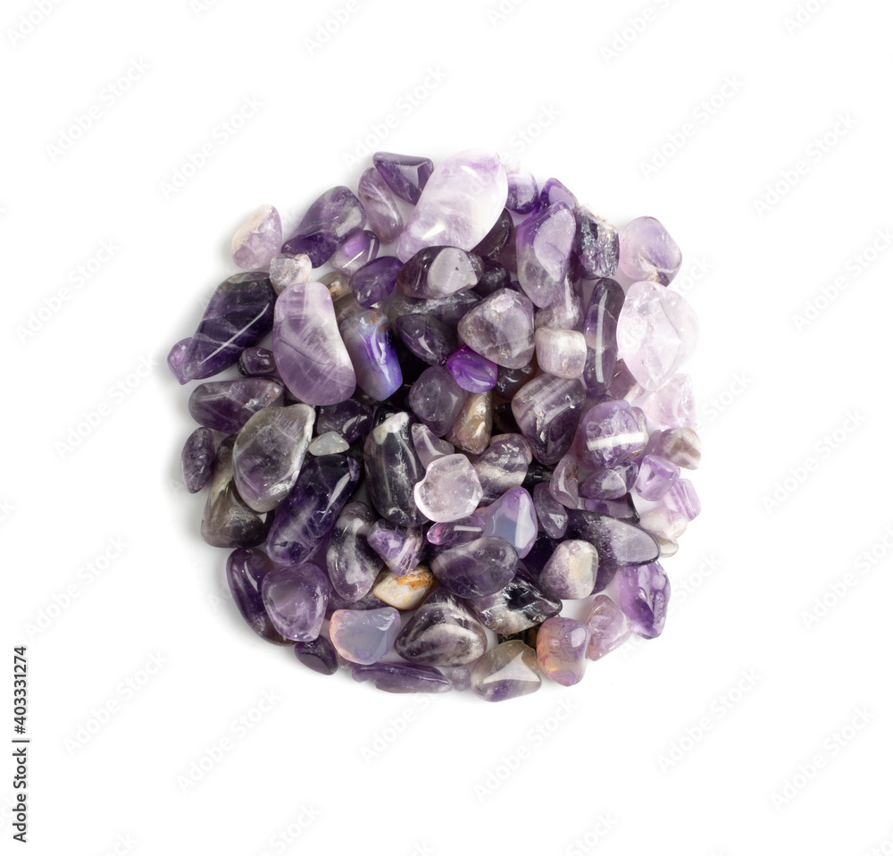 Amethyst crystals isolated. Purple quartz pebbles and crystal Amethyst crystals isolated. Purple quartz pebbles and crystal