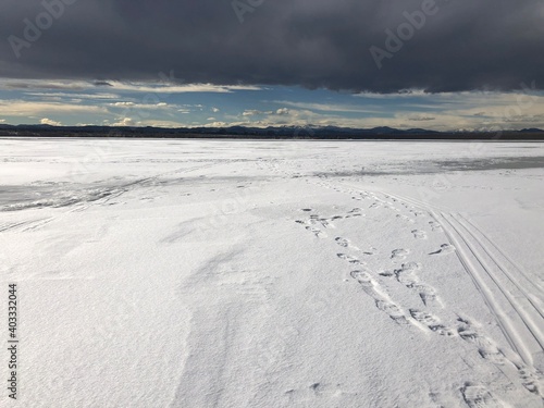 Beautiful Clouds over the frozen lake  Cherry creek state park  Colorado.