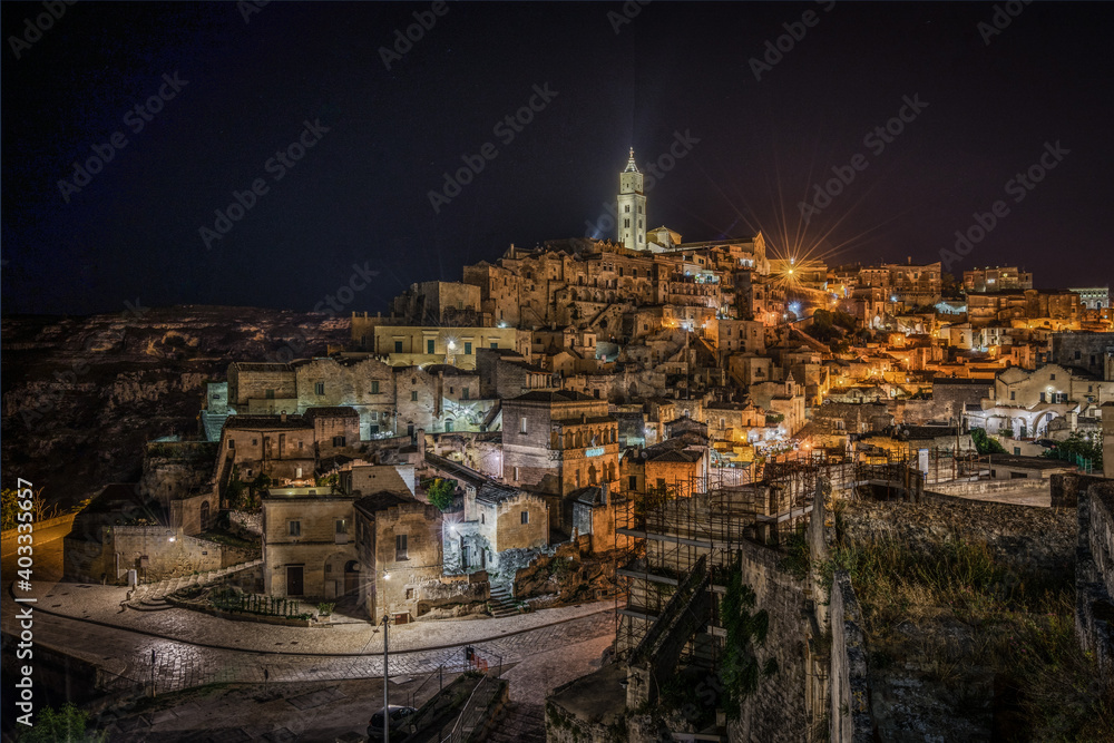 Beautiful night cityscape of Matera with the cathedral in the highest point of the city, Basilicata, Italy