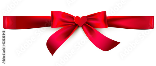 red bow ribbon with heart appliqué isolated on white