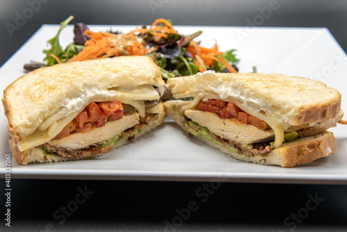 Santa Rosa Chicken sandwich stacked with layers of ingredients of delicious food for this meal