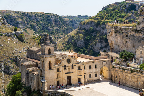 Church of San Pietro Caveso at Sassi di Matera overlooking the canyon (Gravina), Basilicata, Italy photo