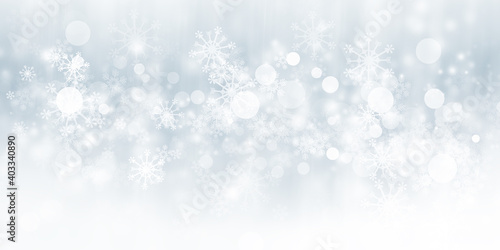 White snowflake blur abstract background. Bokeh Christmas blurred beautiful shiny Christmas lights.