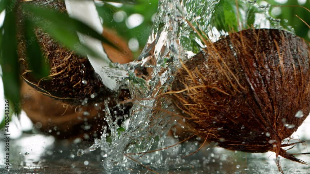 Super Slow Motion Shot of Water Splashing on Coconut at 4K. Super Slow Motion Shot of Water Splashing on Coconut at 4K.