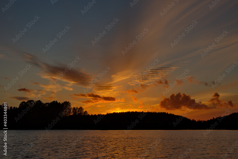 Russia. Republic of Karelia. Autumn flaming sunset on the North-Western coast of Lake Ladoga near the city of Sortavala.