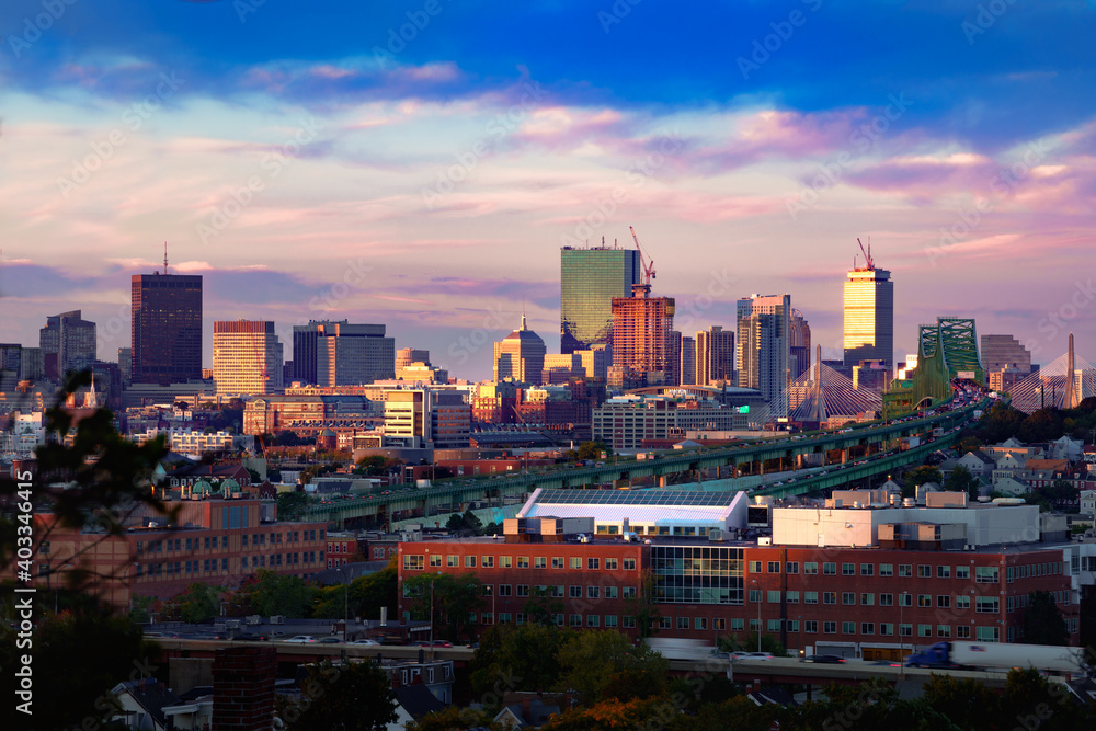 Fototapeta premium Boston city skyline with bridges and highways at dusk