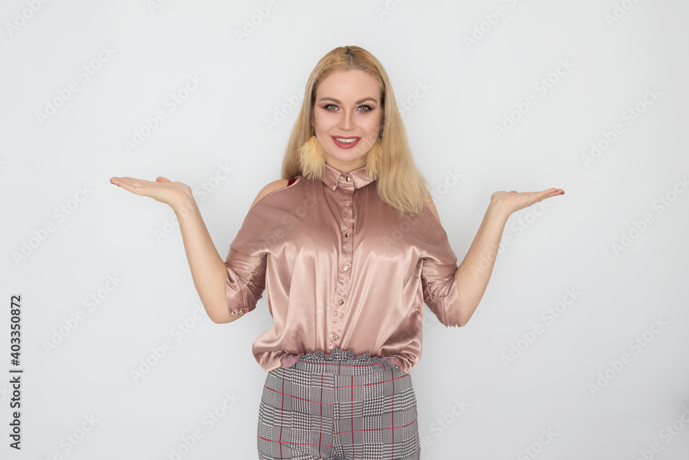 Smiling blonde business woman in pink blouse Smiling blonde business woman in pink blouse