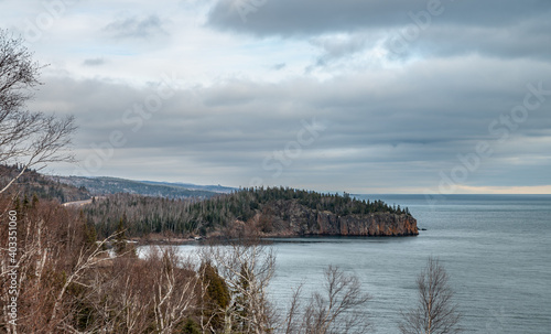 Fototapeta Naklejka Na Ścianę i Meble -  Winter forest on a lake Superior shore