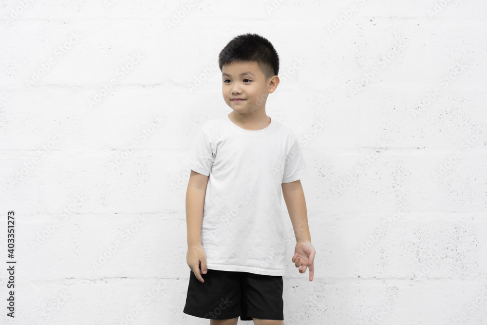 Smart little Asian boy studio portrait on background Smart little Asian boy studio portrait on background
