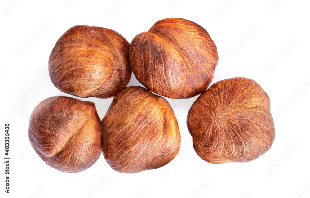 Hazelnuts isolated on white background. Hazel nut macro. Top view. Flat lay. Hazelnuts isolated on white background. Hazel nut macro. Top view. Flat lay.
