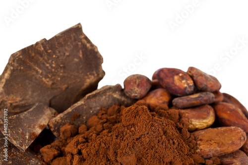 Cocoa beans with cocoa powder and cocoa pieces isolated on a white background. © Snowbelle